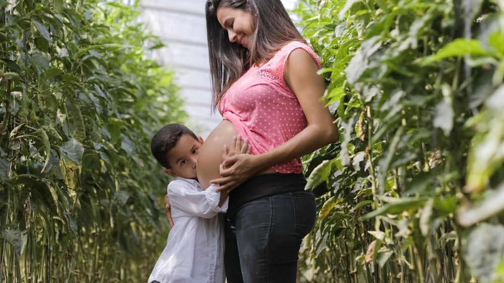 pregnant women with child